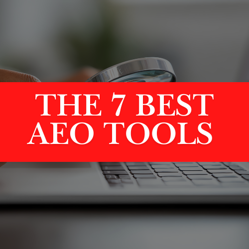 Magnifying glass over laptop keyboard with text